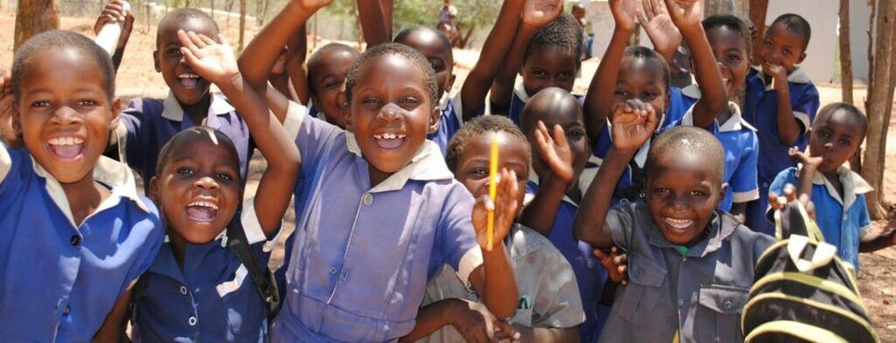 Close-up of smiling and laughing students in Zimbabwe.