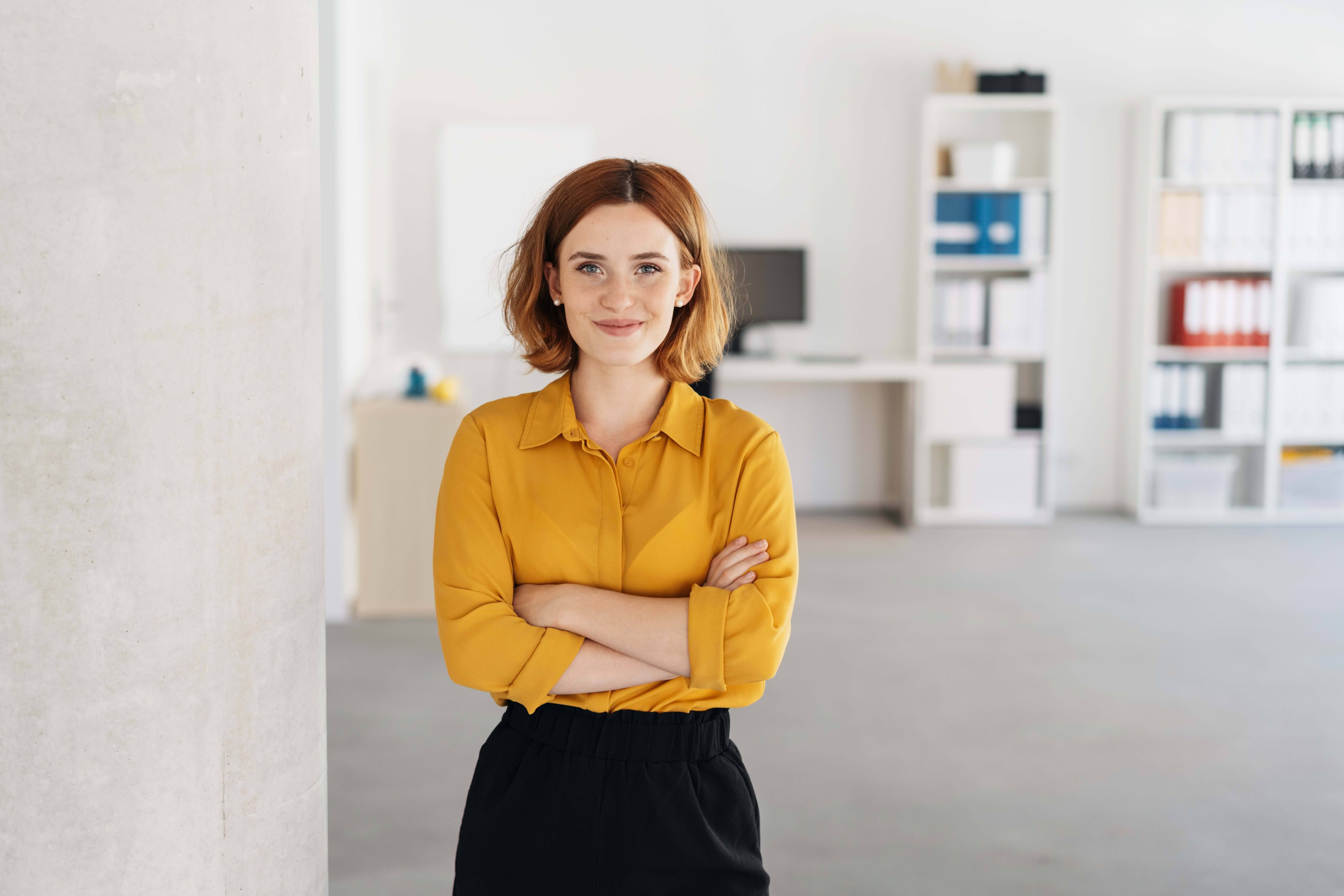 Portrait of a smiling woman in an office