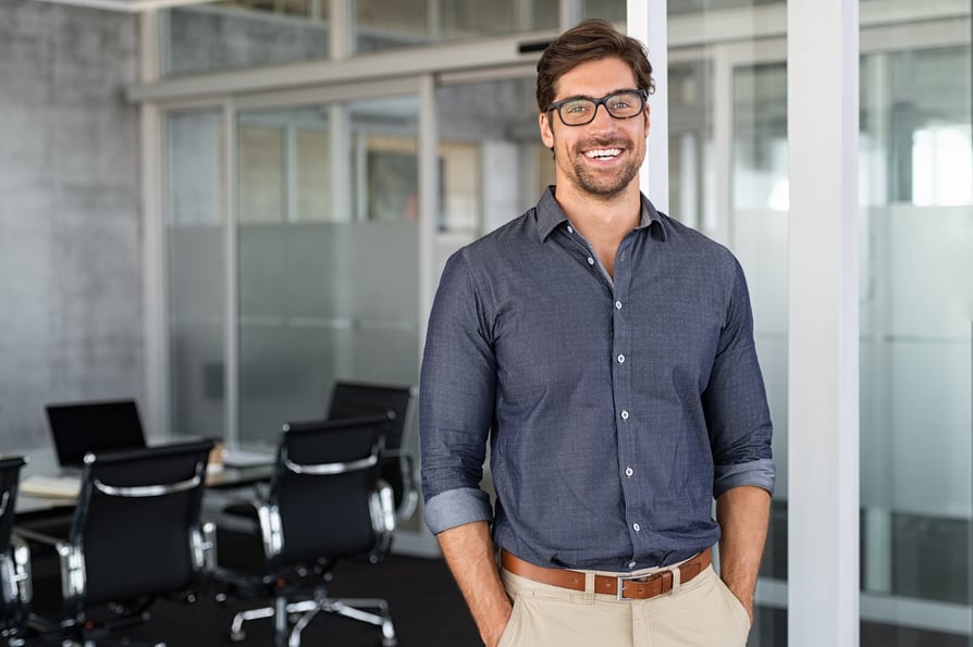 Portrait of a smiling businessman in an office setting
